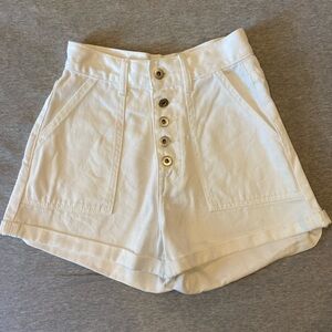 White DISSH denim button fly cuffed shorts